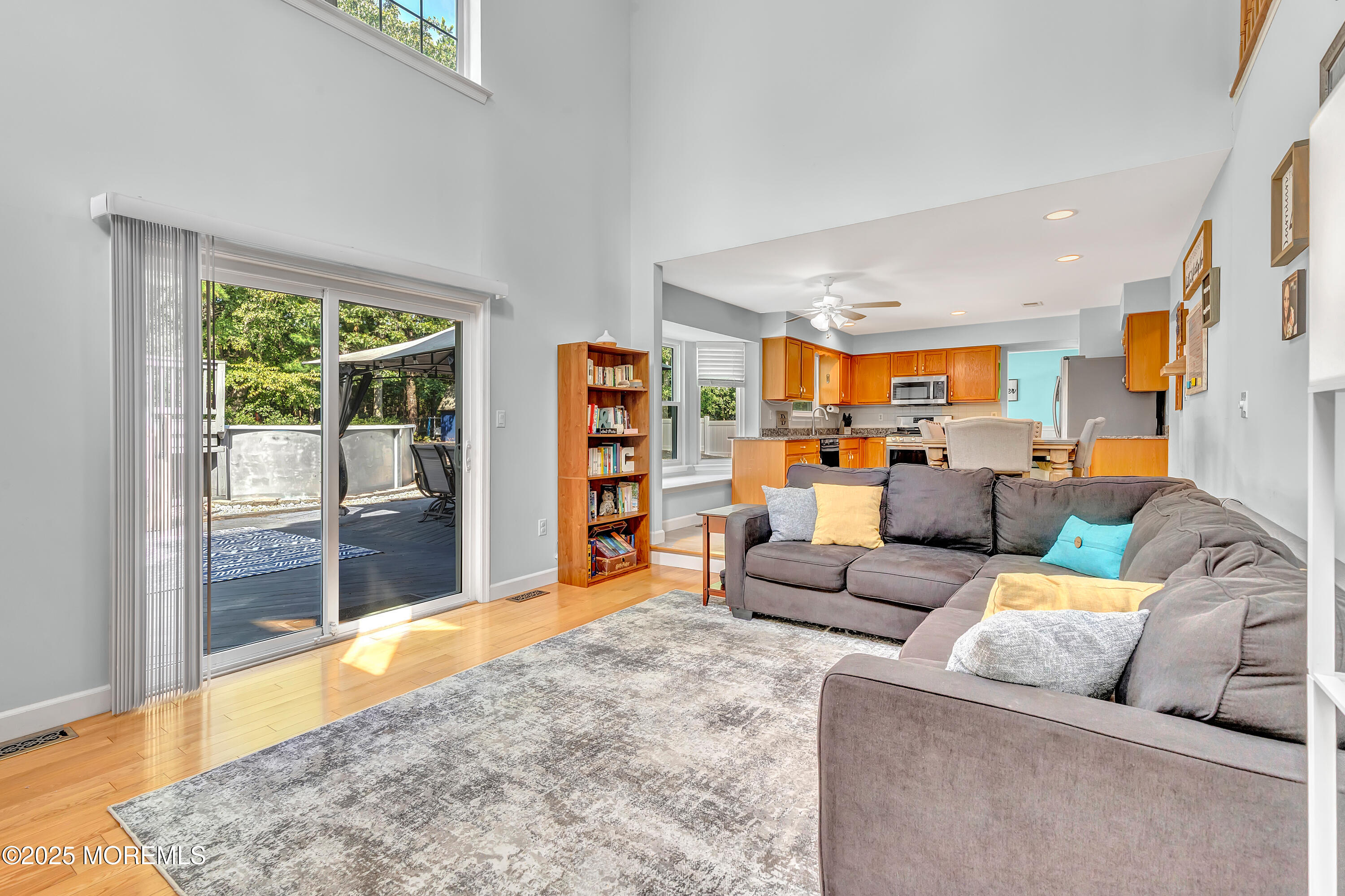 66 Diamond Lane Howell, NJ 07731 - Photo 7 of 47 a living room with furniture and a large window
