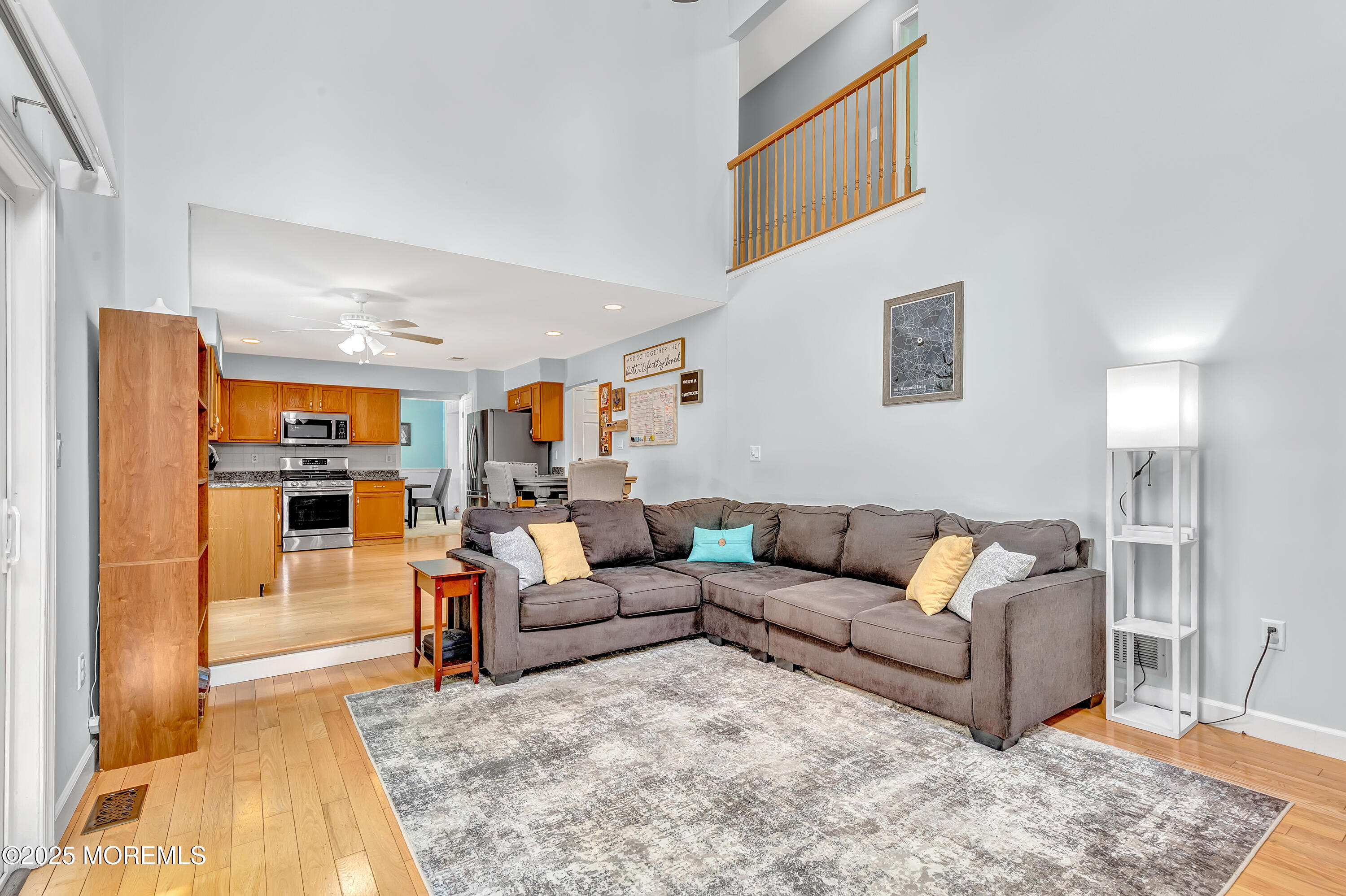 66 Diamond Lane Howell, NJ 07731 - Photo 8 of 47 a living room with furniture and a rug