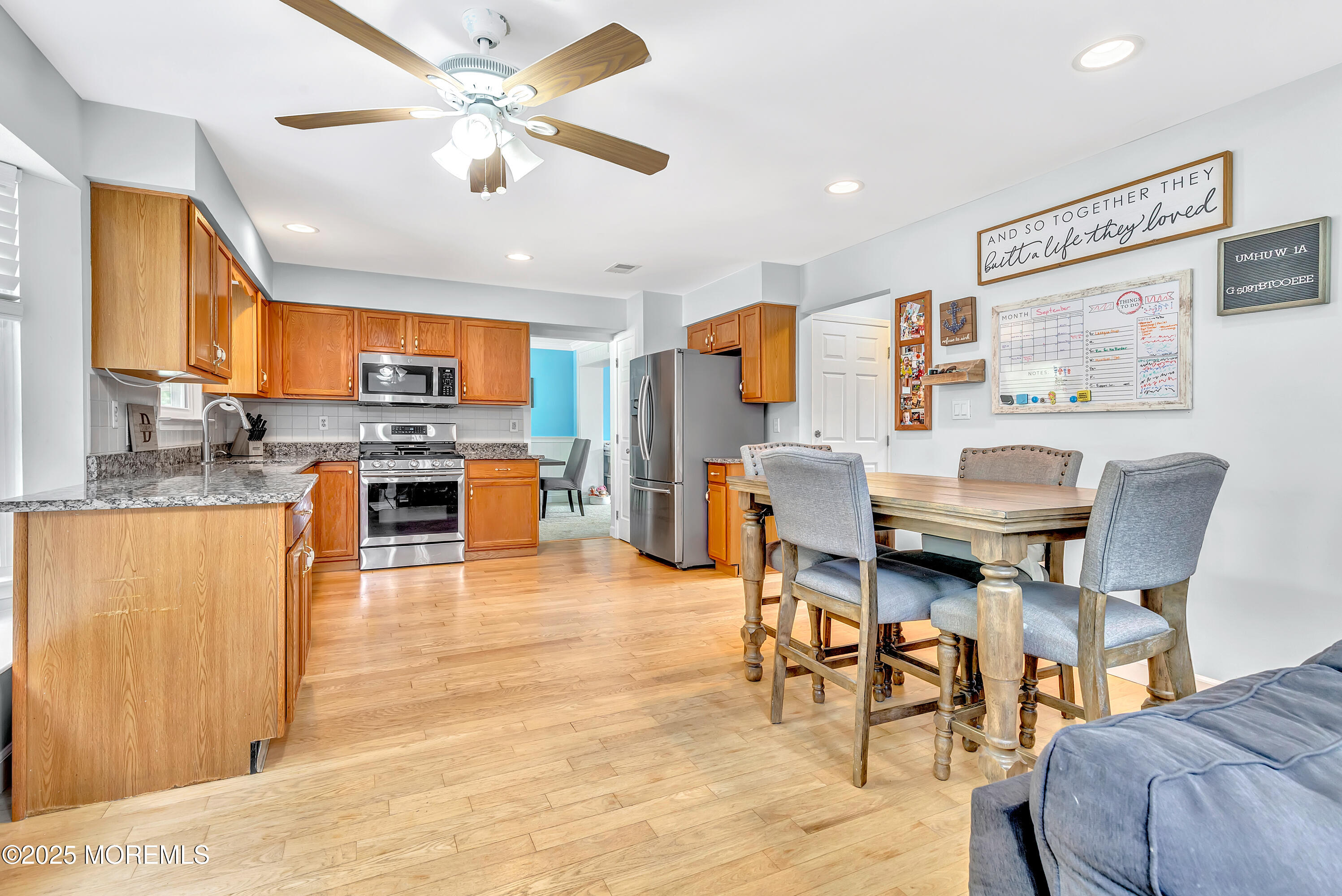 66 Diamond Lane Howell, NJ 07731 - Photo 10 of 47 a view of kitchen with stainless steel appliances granite countertop cabinets and a dining table