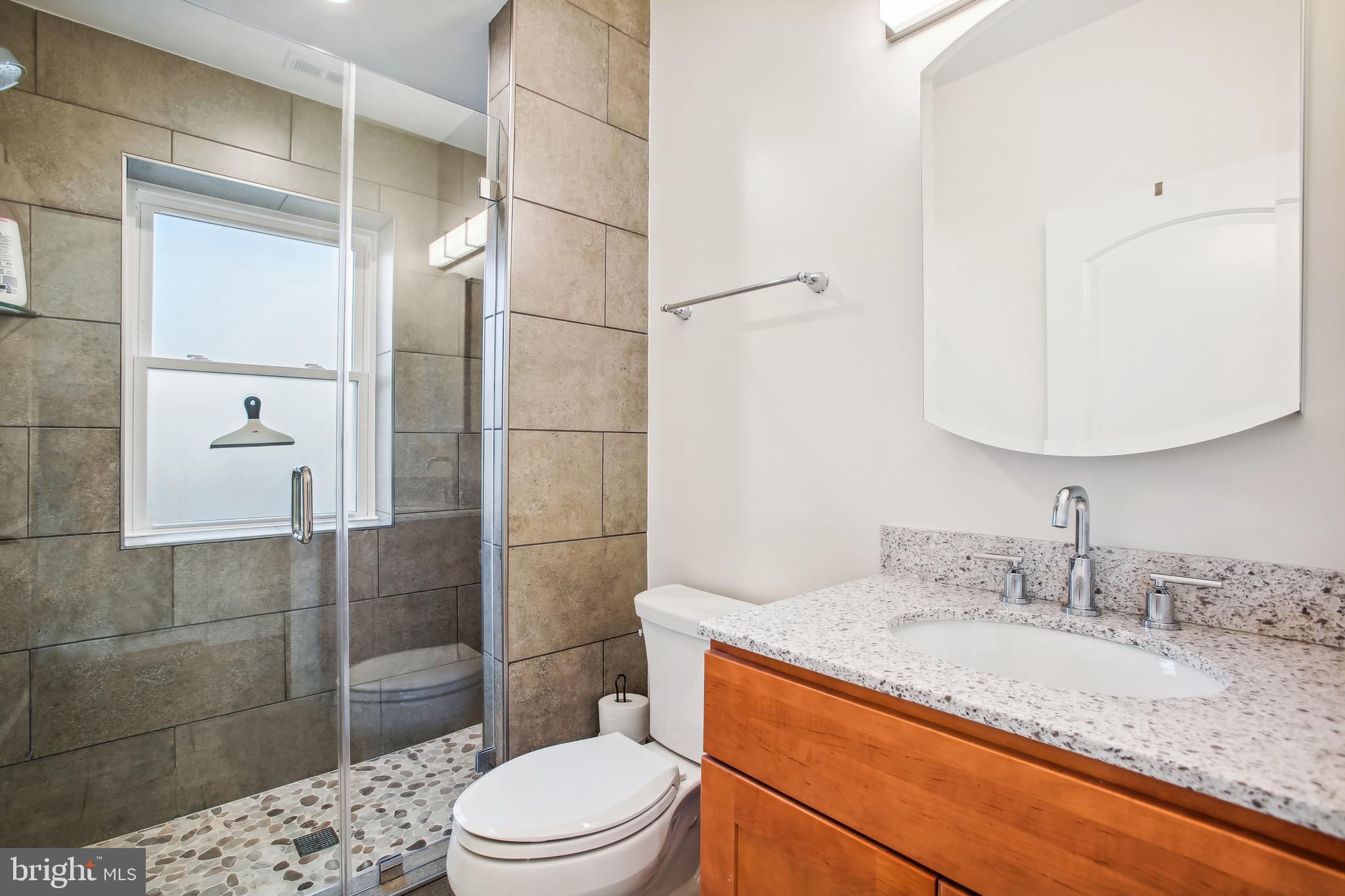 5216 Old Mill Road Alexandria, VA 22309 - Photo 23 of 82 Main Level Bathroom off Primary Bedroom
