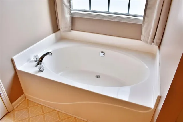 a bathroom with a bathtub