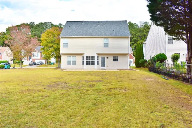 a front view of a house with an ocean view