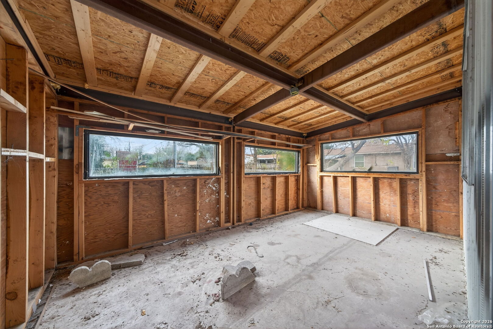 4531 Eisenhauer Road San Antonio, TX 78218 - Photo 32 of 32 a view of an empty room with a balcony