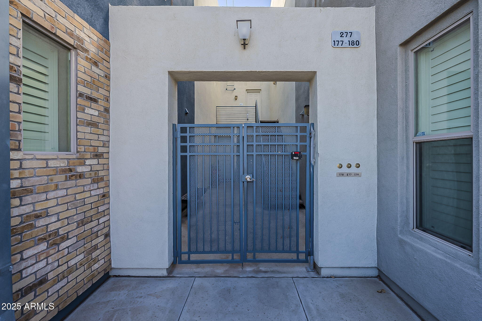 615 East Portland Street, Unit 277 Phoenix, AZ 85004 - Photo 4 of 39 a view of front door with chandelier