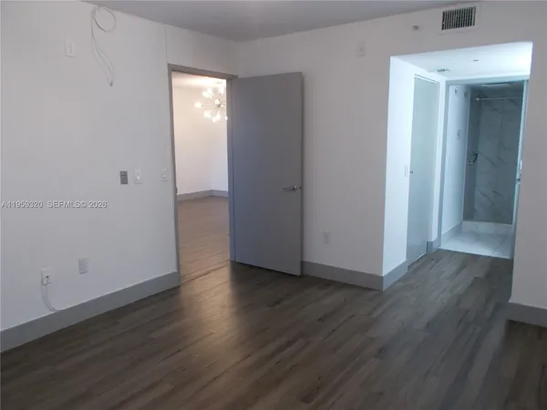 a view of an empty walk in closet
