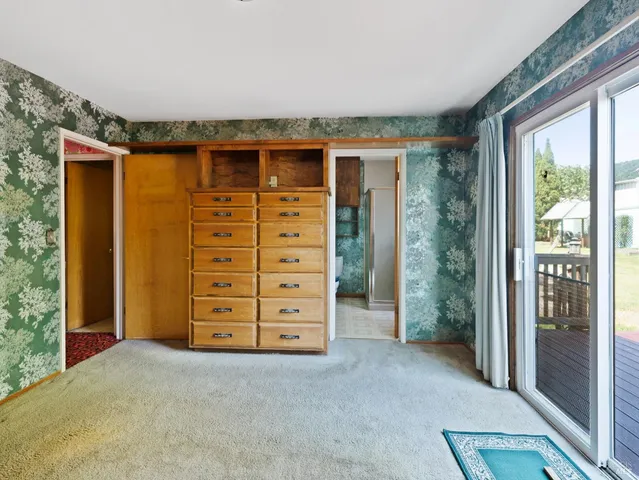 wooden floor and window in an empty room