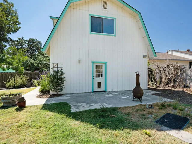 a view of backyard of a house