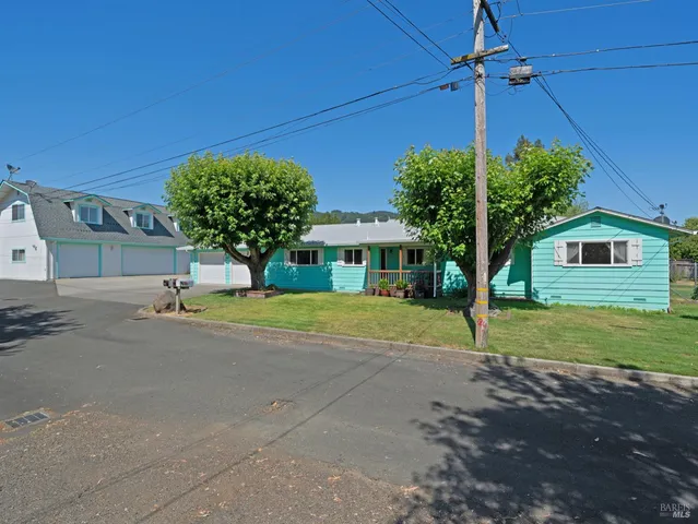 a view of a house with a street