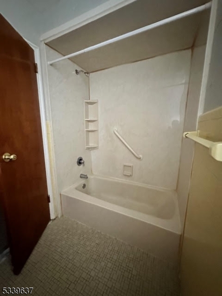 148 Newark Avenue, Unit 3 Belleville, NJ 07109 - Photo 6 of 7 a bathroom with a bathtub
