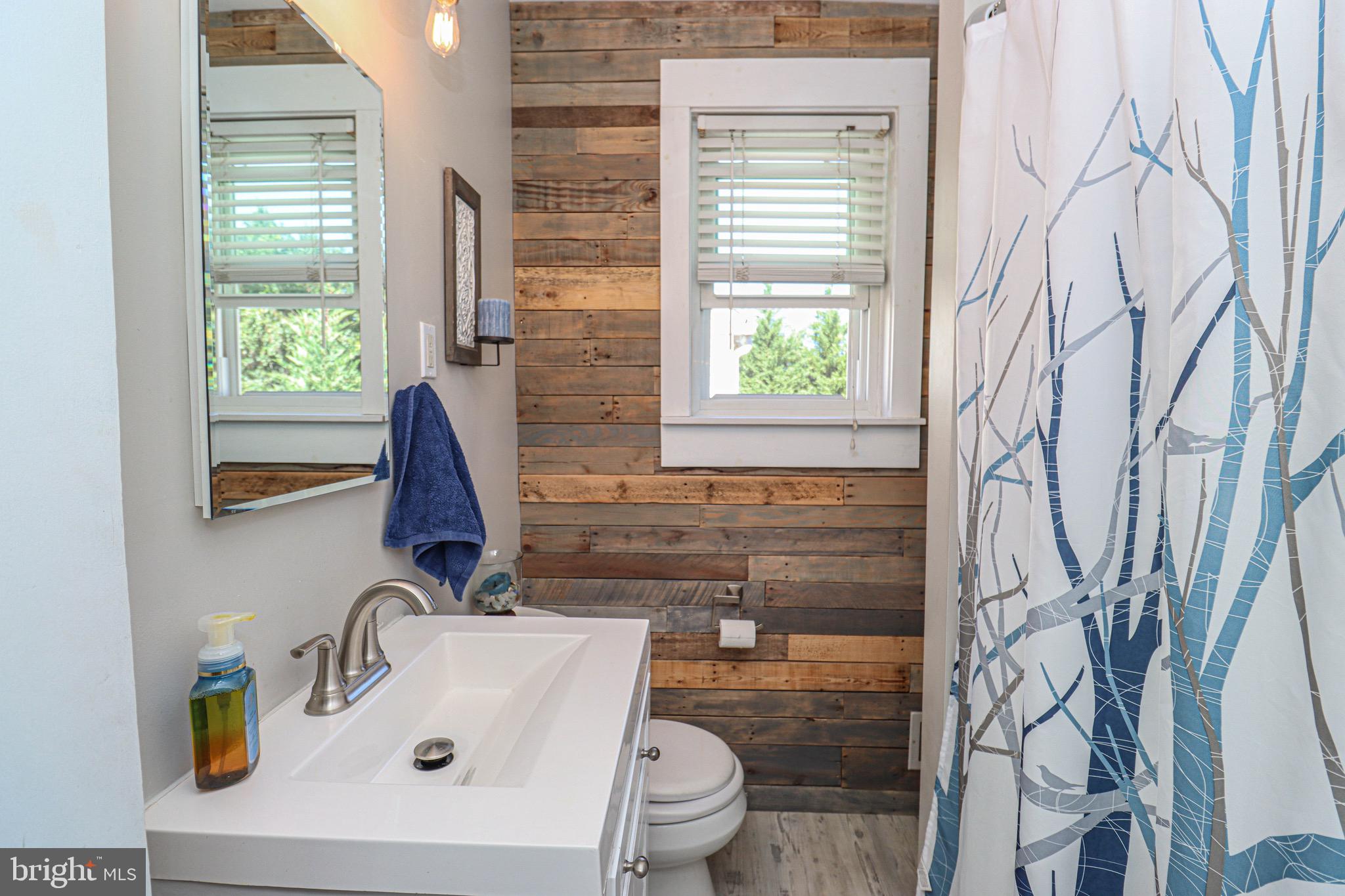 159 Meadow Road Pasadena, MD 21122 - Photo 18 of 56 How cool is the Wood Wall?