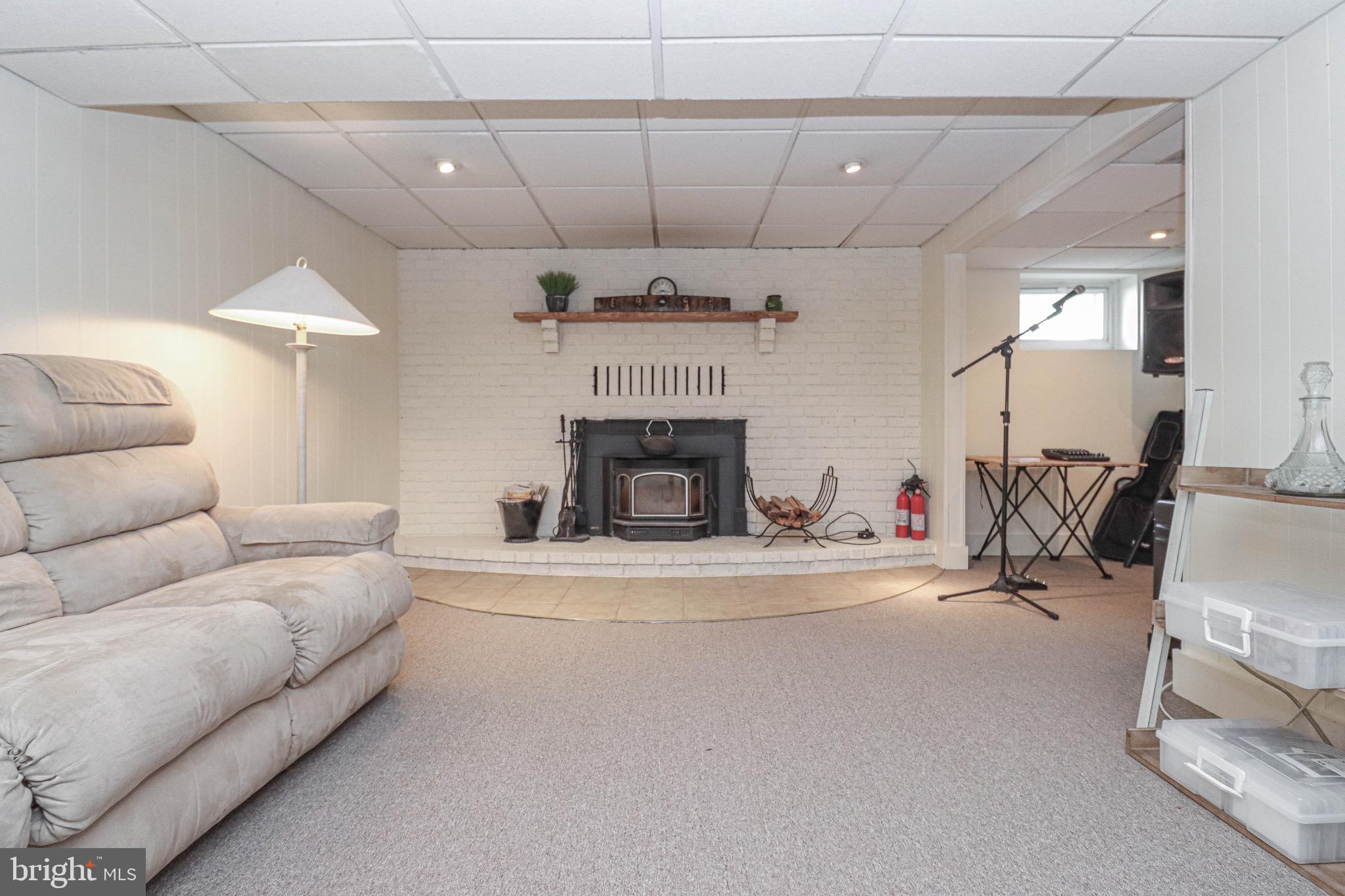 159 Meadow Road Pasadena, MD 21122 - Photo 30 of 56 Fireplace with Wood Burning Insert