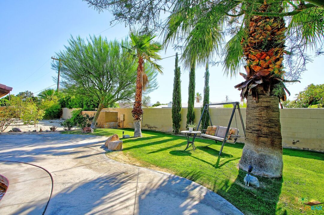2288 North Deborah Road Palm Springs, CA 92262 - Photo 17 of 33 a view of a park with swings and slides