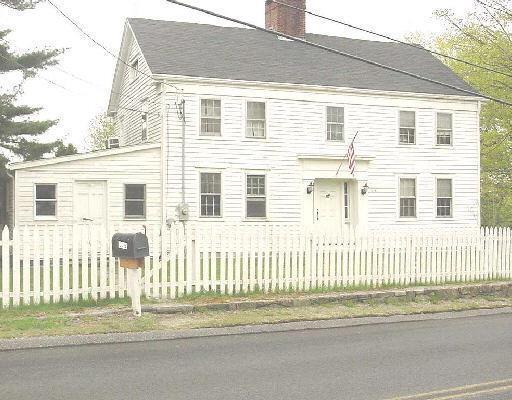 275 Cross Hill Road Monroe, CT 06468 - Photo 1 of 1 a front view of a house with a garden