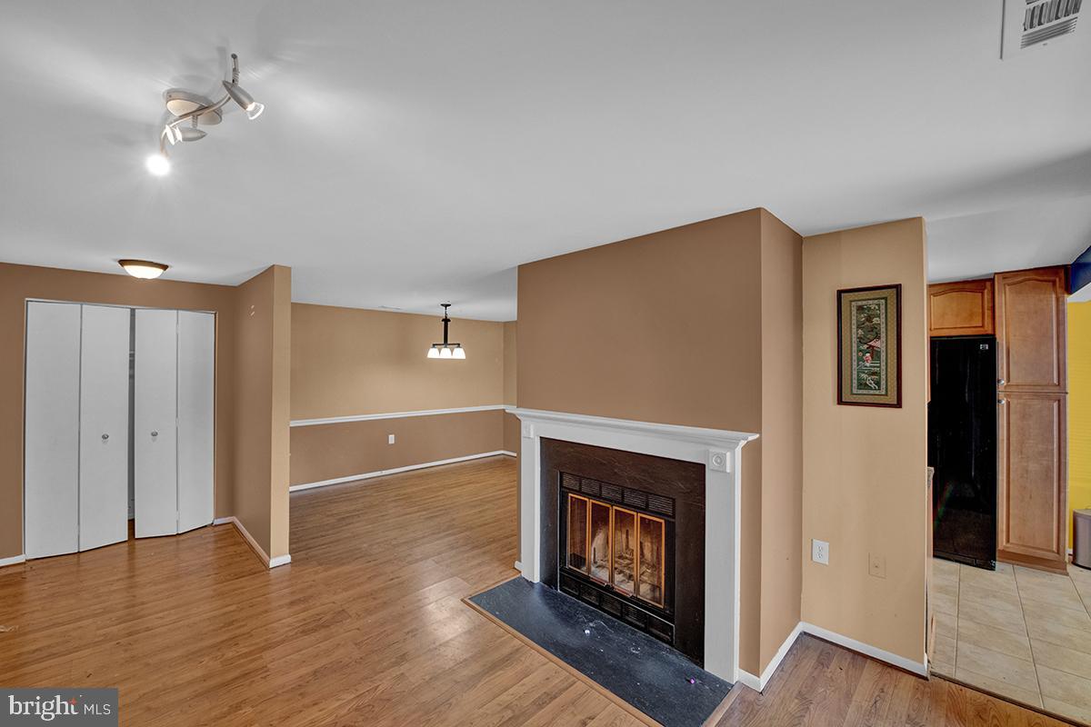 13257 Wonderland Way, Unit 1101 Germantown, MD 20874 - Photo 10 of 51 a view of a livingroom with a fireplace
