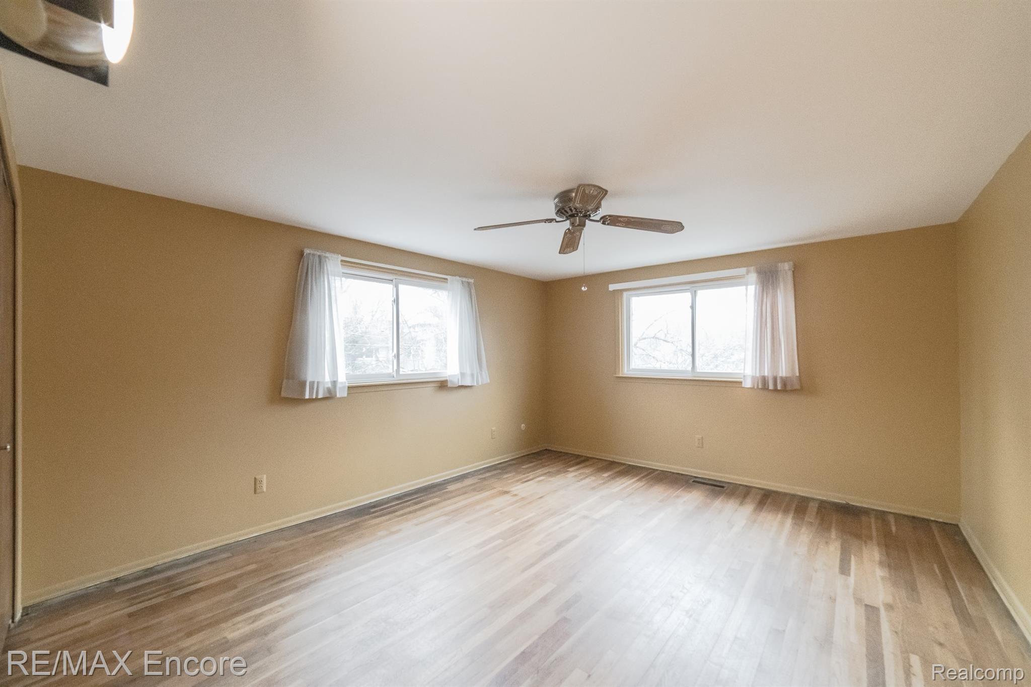 948 Spartan Court Rochester, MI 48309 - Photo 27 of 41 Bedroom with recently exposed hardwood floors