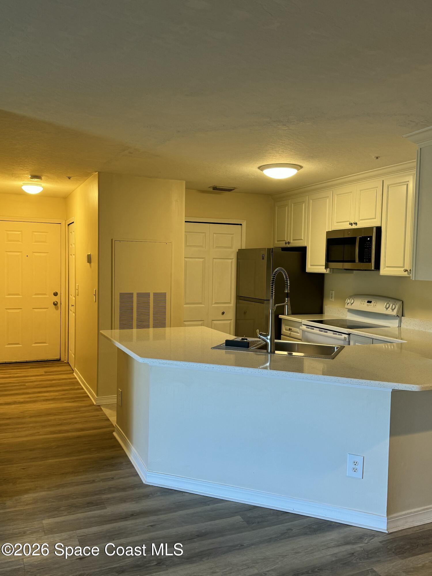 7667 North Wickham Road, Unit 710 Melbourne, FL 32940 - Photo 5 of 14 IMG_7730