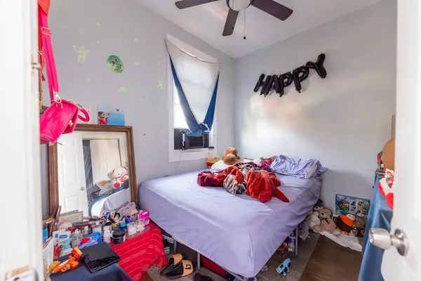 a bedroom with furniture and a bed