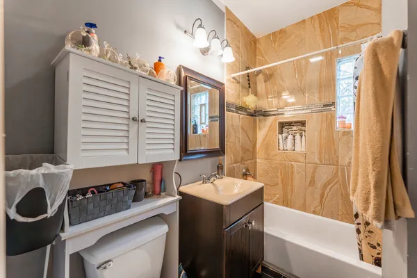 a bathroom with a sink and a bathtub