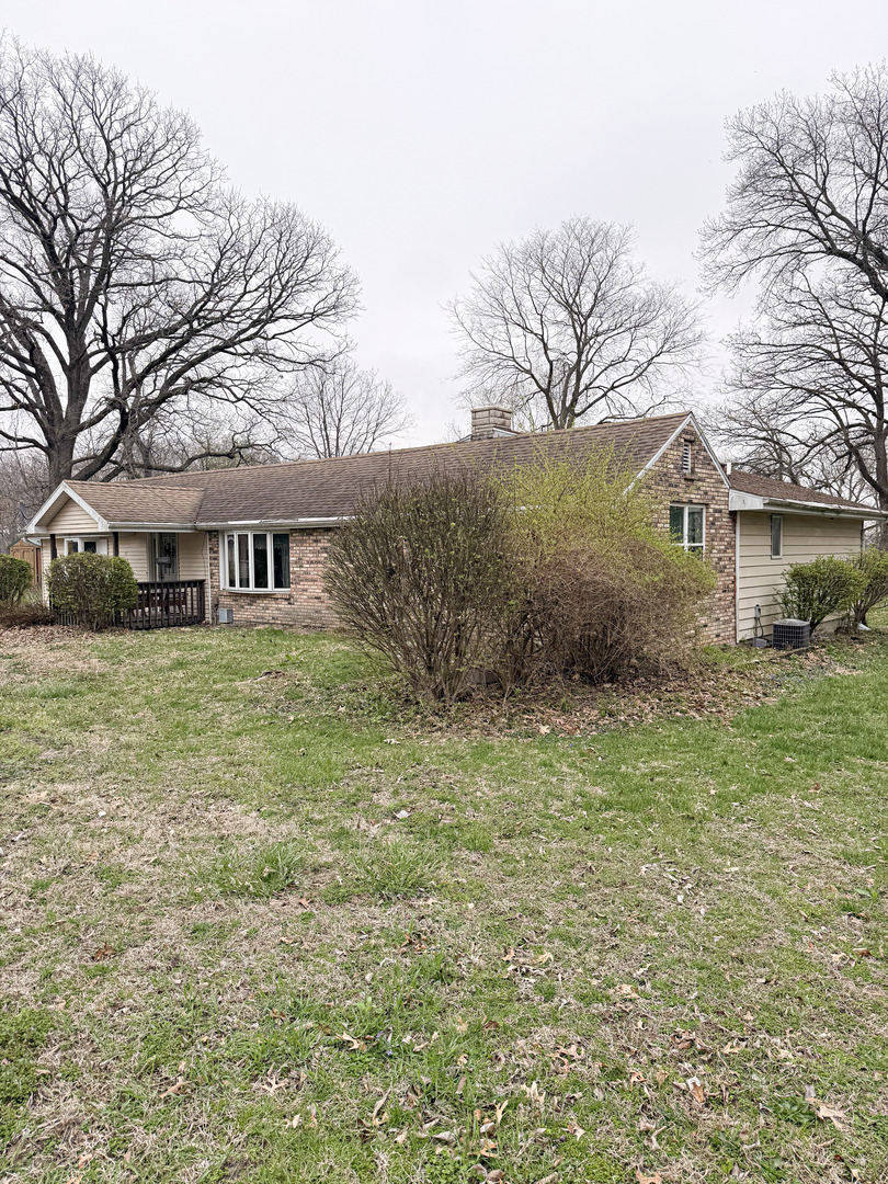 1599 East 2700 North Road Clifton, IL 60927 - Photo 3 of 26 a view of house with yard