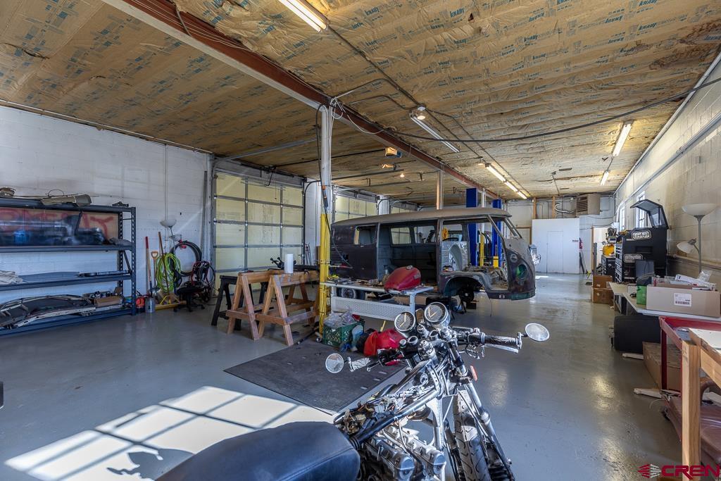 27 South Broadway Cortez, CO 81321 - Photo 11 of 35 a view of a garage with lots of stuff