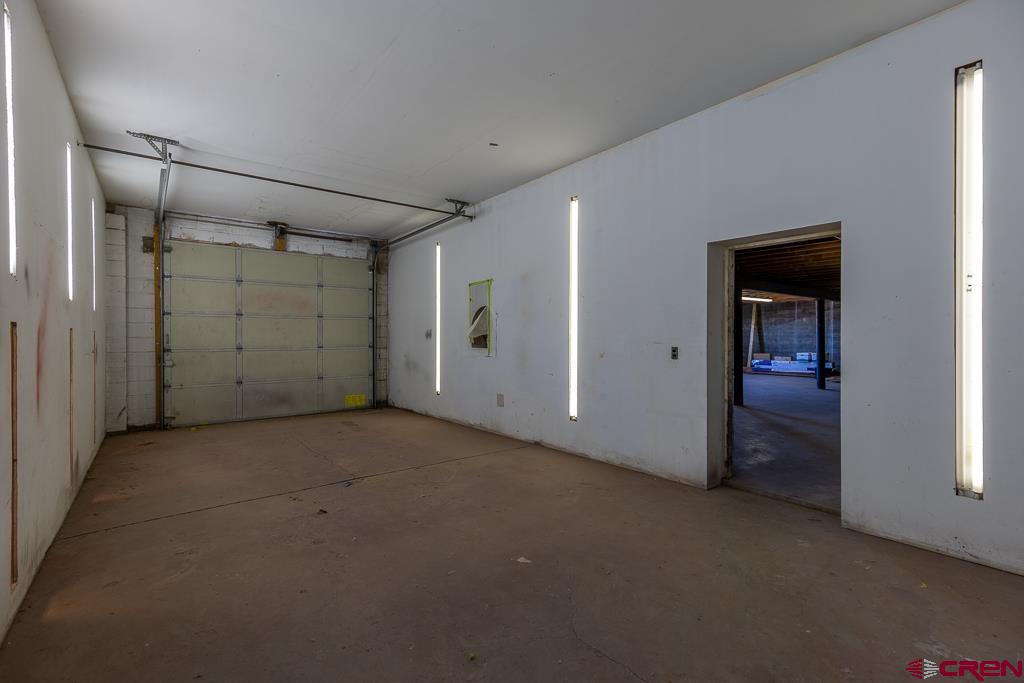27 South Broadway Cortez, CO 81321 - Photo 18 of 35 an empty room with closet and natural light