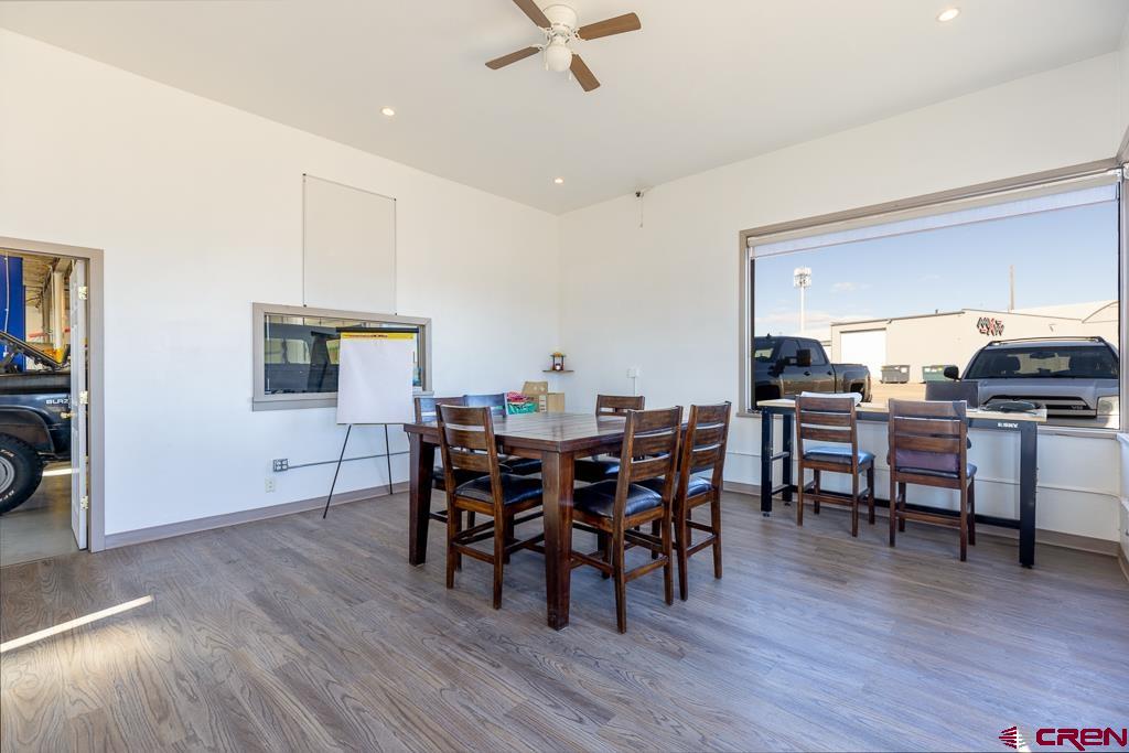 27 South Broadway Cortez, CO 81321 - Photo 5 of 35 a view of a dining room with furniture and wooden floor