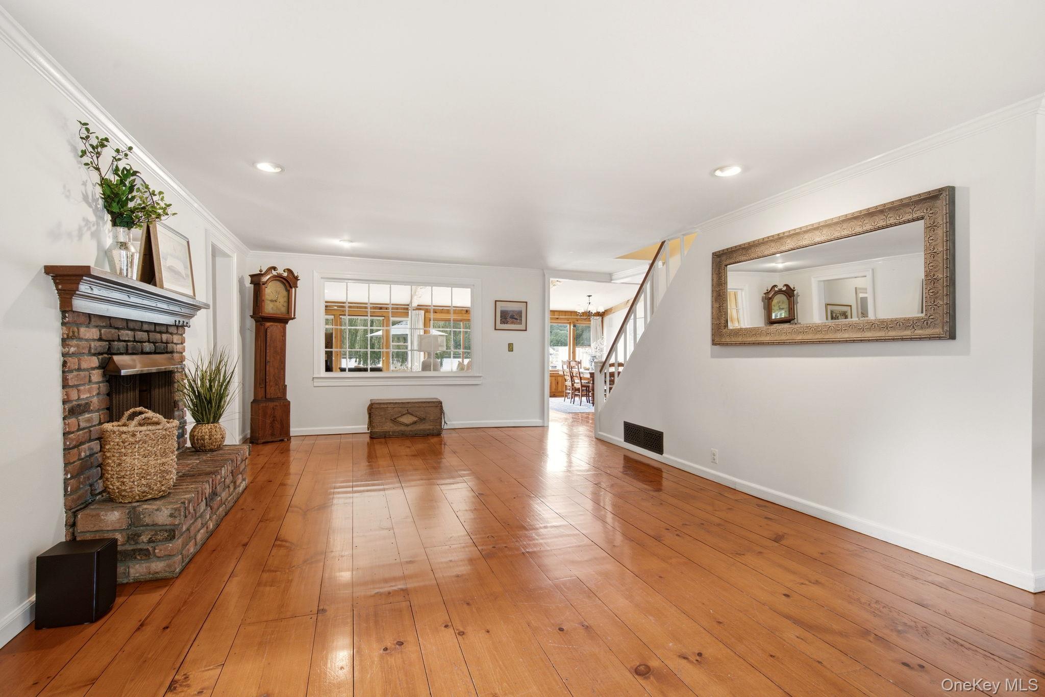 33 Prospect Road Centerport, NY 11721 - Photo 9 of 48 Gleaming Heart Pine Floors in Living Room.