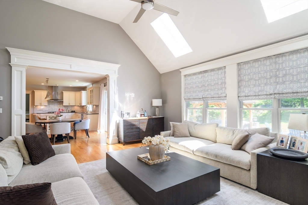 2 Hunters Lane Natick, MA 01760 - Photo 9 of 40 a living room with furniture wooden floor and a large window