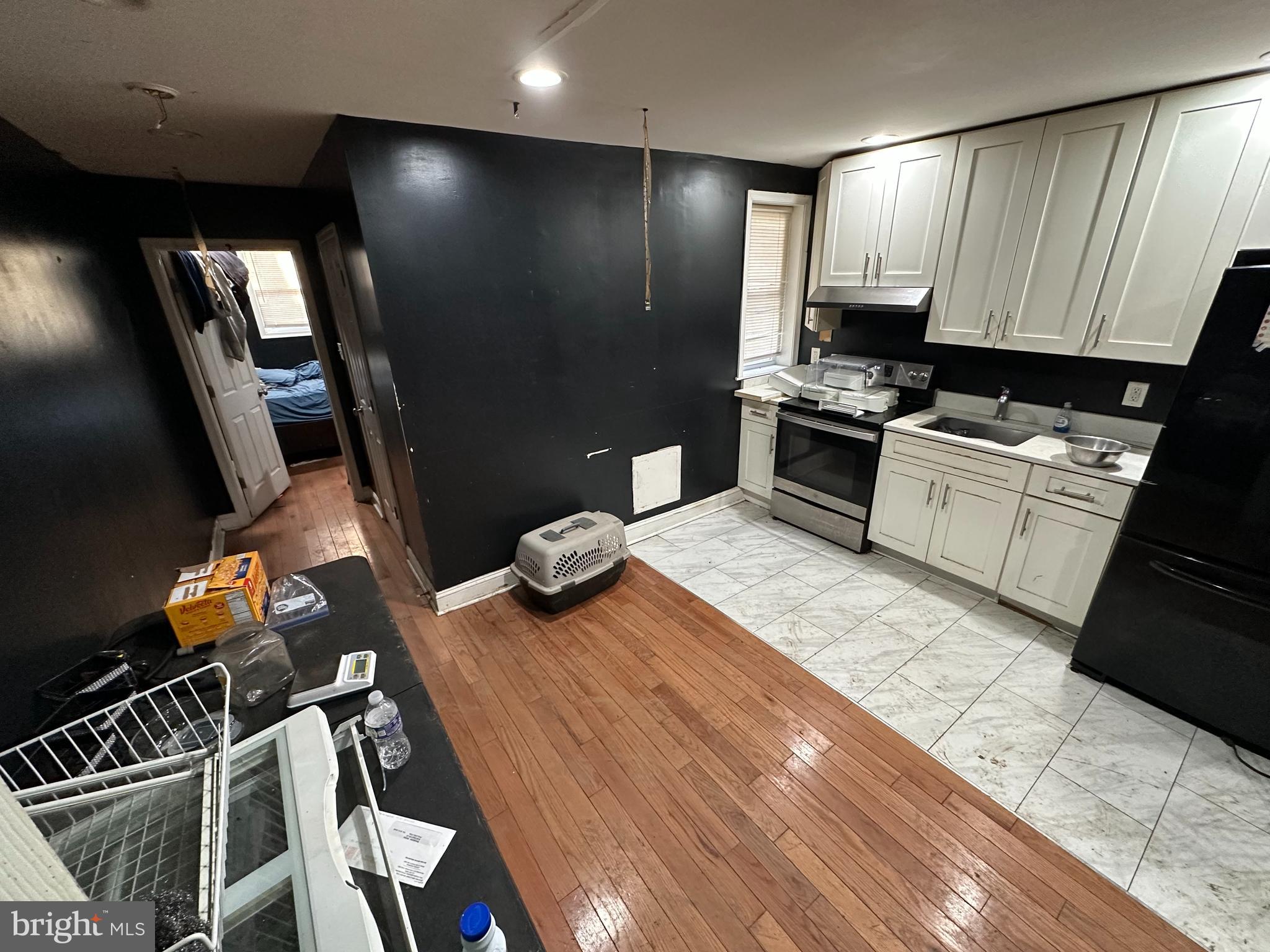 5538 Master Street Philadelphia, PA 19131 - Photo 21 of 30 a kitchen with a sink appliances and cabinets