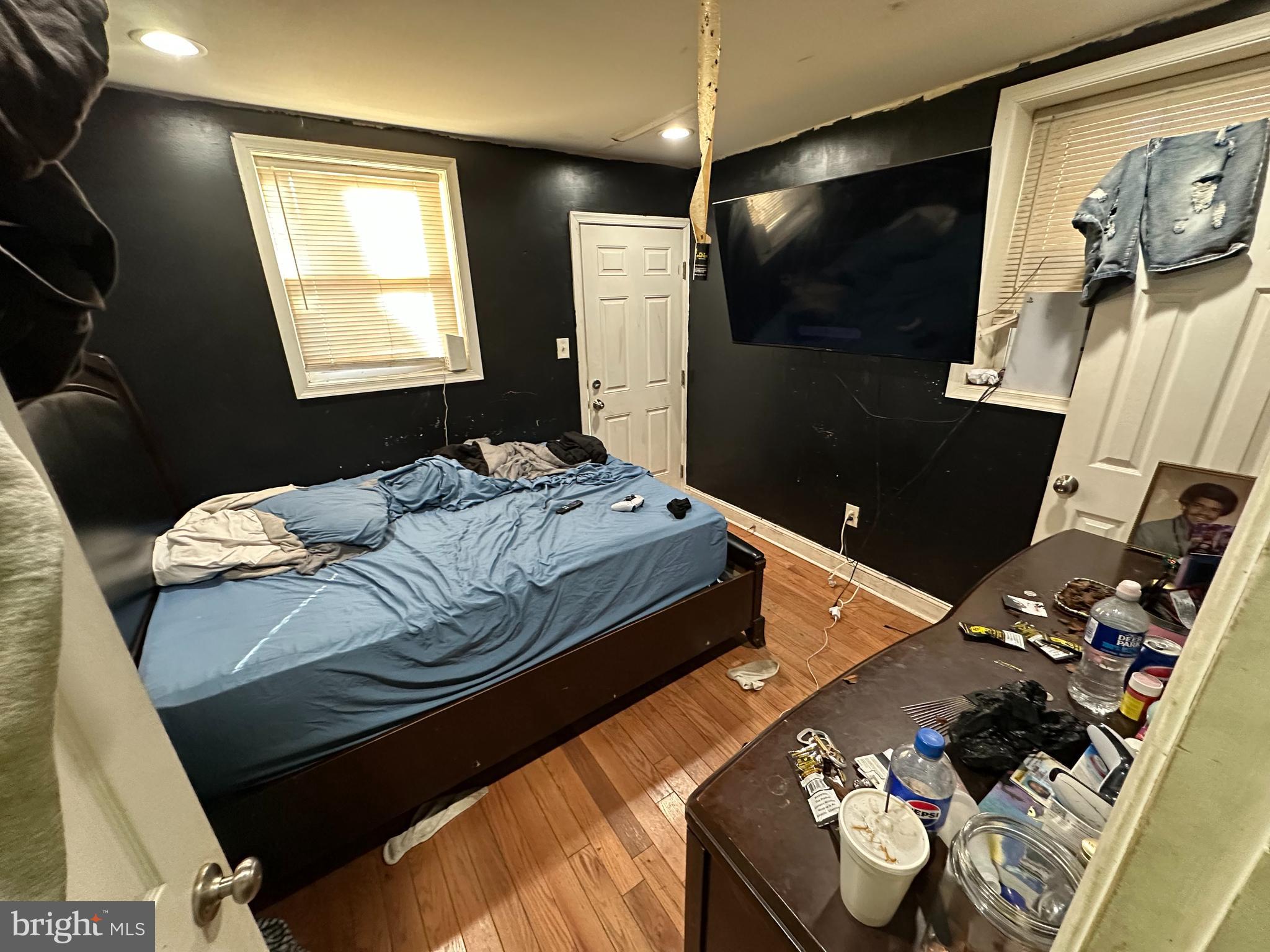 5538 Master Street Philadelphia, PA 19131 - Photo 25 of 30 a bedroom with bed and a flat screen tv