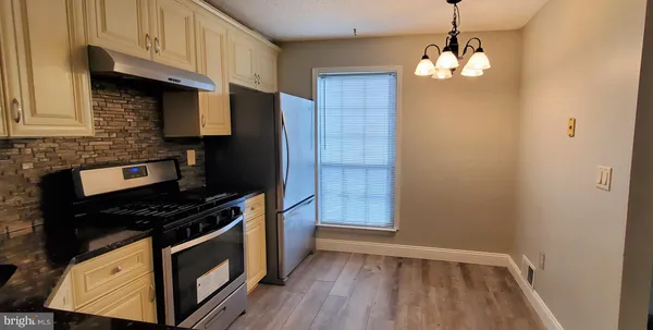 an empty room that has a window