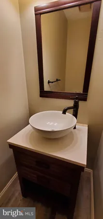 a bathroom with a toilet and a sink