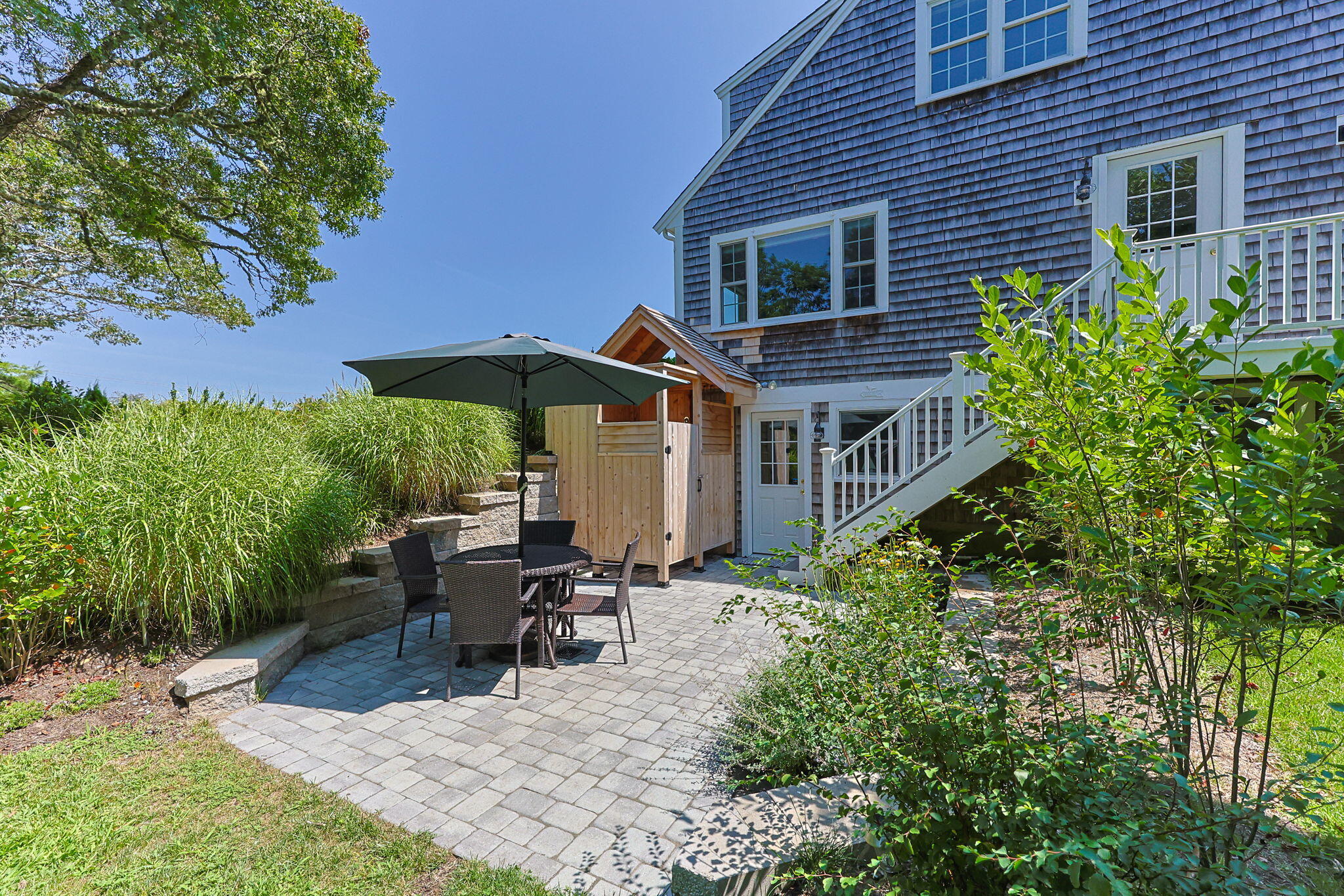 58 Stepping Stones Road Chatham, MA 02633 - Photo 37 of 52 a view of a house with backyard and sitting area