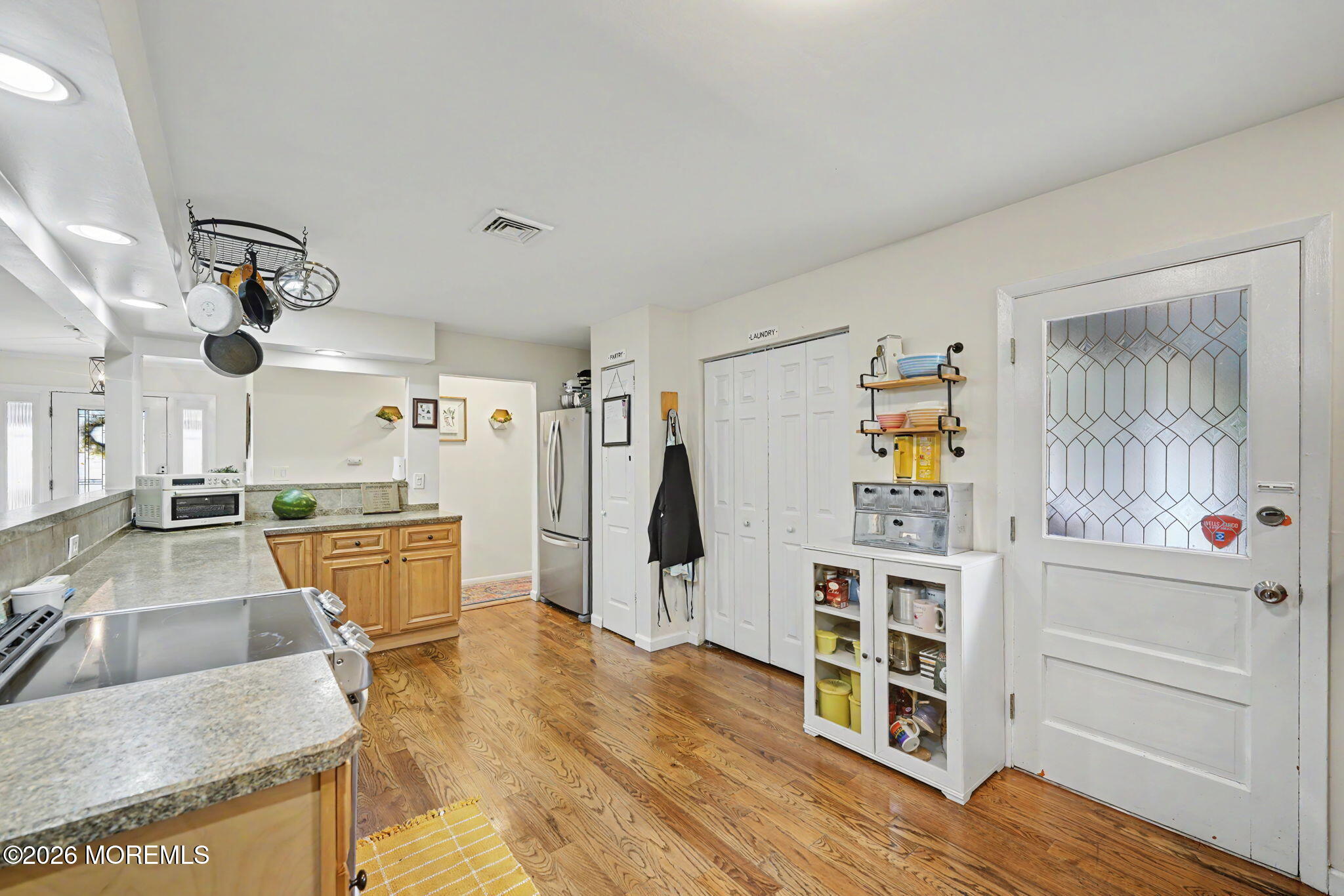 699 Aldrich Road Howell, NJ 07731 - Photo 8 of 30 a view of a living room and wooden floor