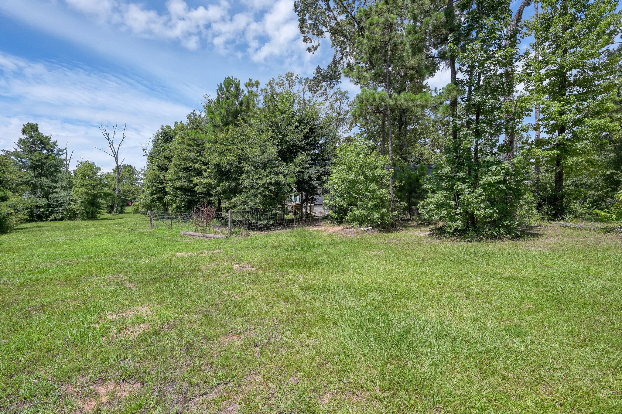 400 Raven Hill Road Oakhurst, TX 77359 - Photo 37 of 45 a view of outdoor space and yard