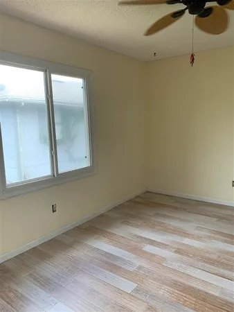 a bathroom with a toilet and shower