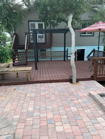 a view of outdoor space yard deck patio and outdoor kitchen