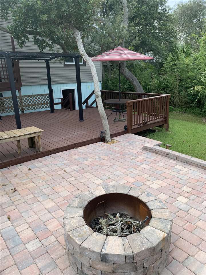 6484 Brevard Street St. Augustine, FL 32080 - Photo 19 of 20 a view of outdoor space yard deck patio and outdoor kitchen