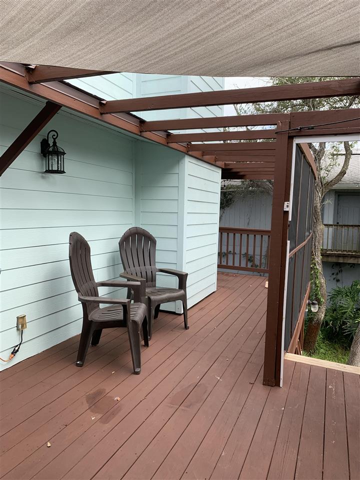 6484 Brevard Street St. Augustine, FL 32080 - Photo 5 of 20 a view of a two chairs and table in a balcony