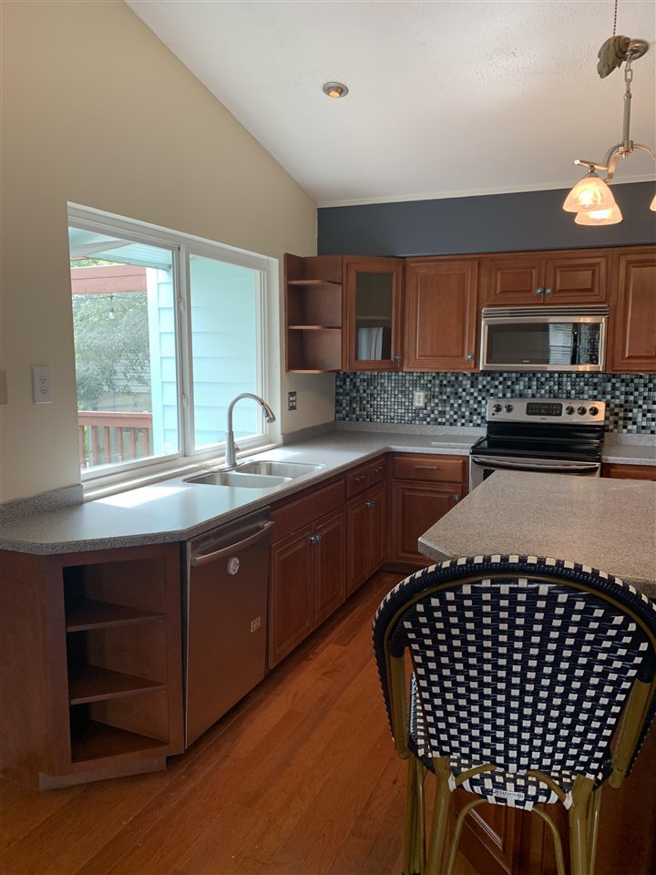 6484 Brevard Street St. Augustine, FL 32080 - Photo 9 of 20 a kitchen with a sink and cabinets