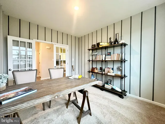 a view of a livingroom with furniture and window