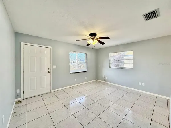a view of an empty room and window