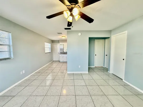 a view of an empty room and window
