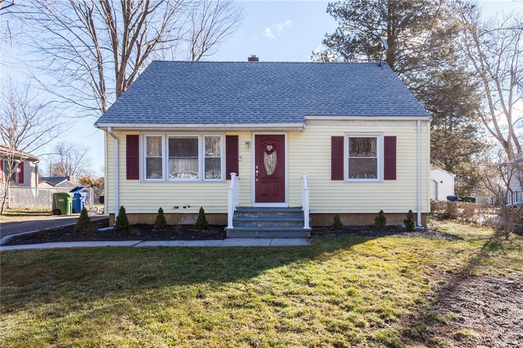 23 Elmwood Road Wallingford, CT 06492 - Photo 1 of 1 a front view of a house with a yard