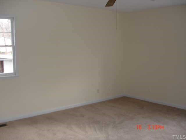 One of three upstairs bedrooms, all freshly painted and carpeted. Other