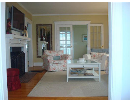 201 Weston Road Wellesley, MA 02482 - Photo 5 of 14 a living room with furniture and a fireplace