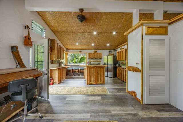 a view of a living room with a flat screen tv