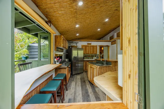 a view of a living room and dining room