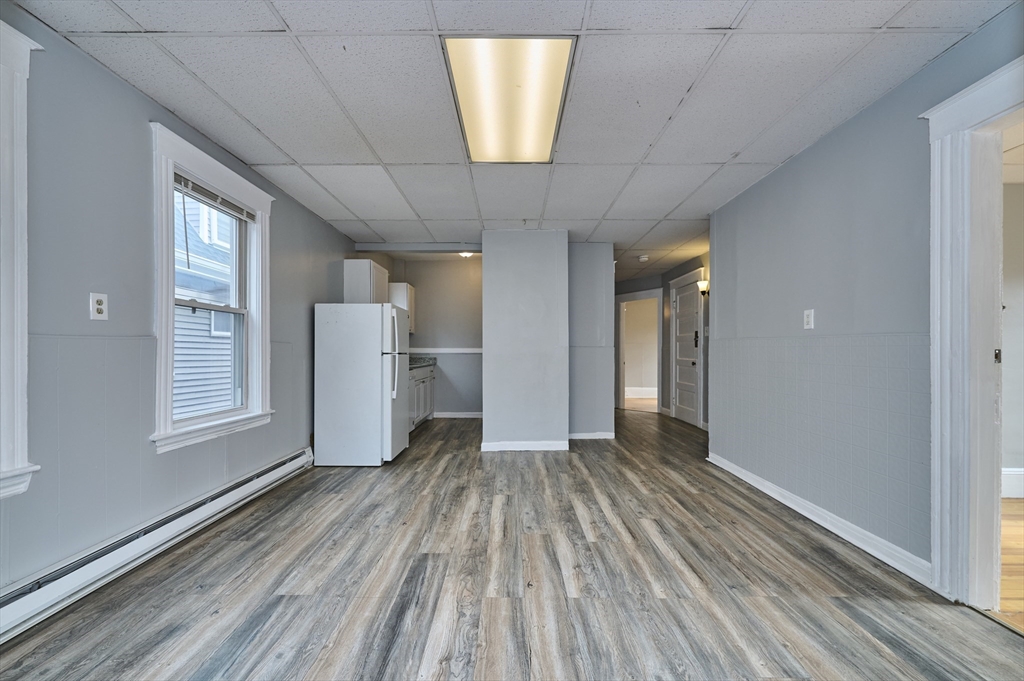 41 Salem Street, Unit 2L Salem, MA 01970 - Photo 2 of 18 a view of empty room with wooden floor and window