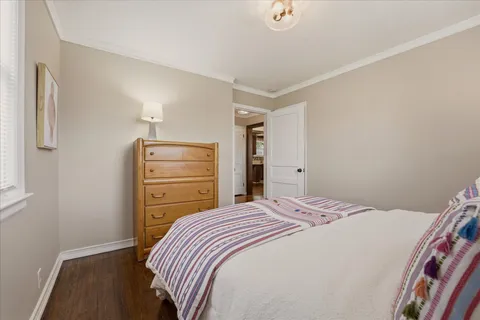 a bedroom with a bed and a closet